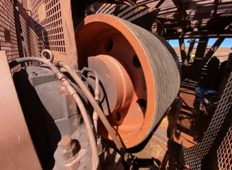 Conveyor pulley monitored by a Miniotec wireless vibration sensor