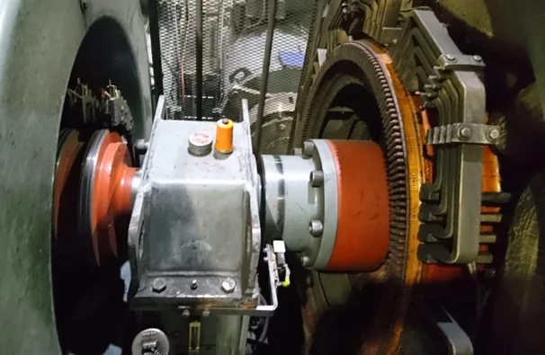 Wireless vibration sensor installed on auxiliary equipment at a coal mine