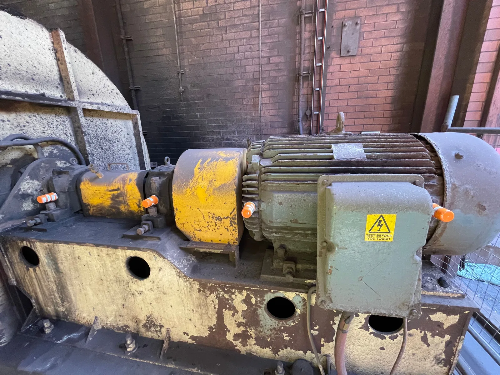 Miniotec wireless vibration sensor installed on industrial rotating equipment