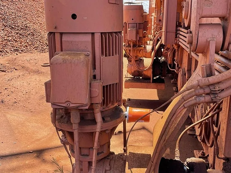 Wireless vibration sensor installed at a load point on plant equipment